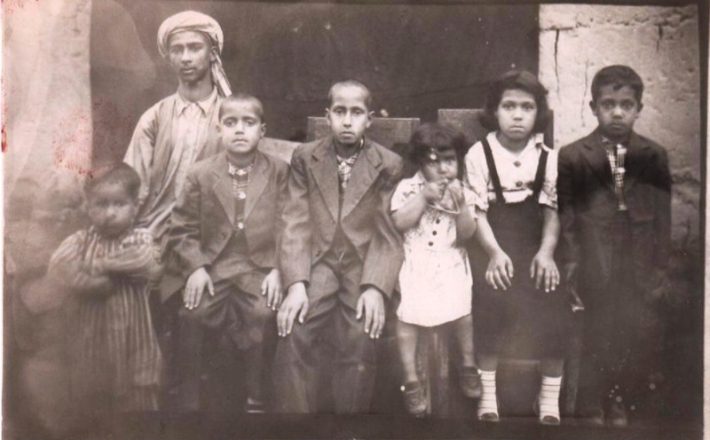 Atta Arghandiwal with siblings before his departure near the Oxus River.